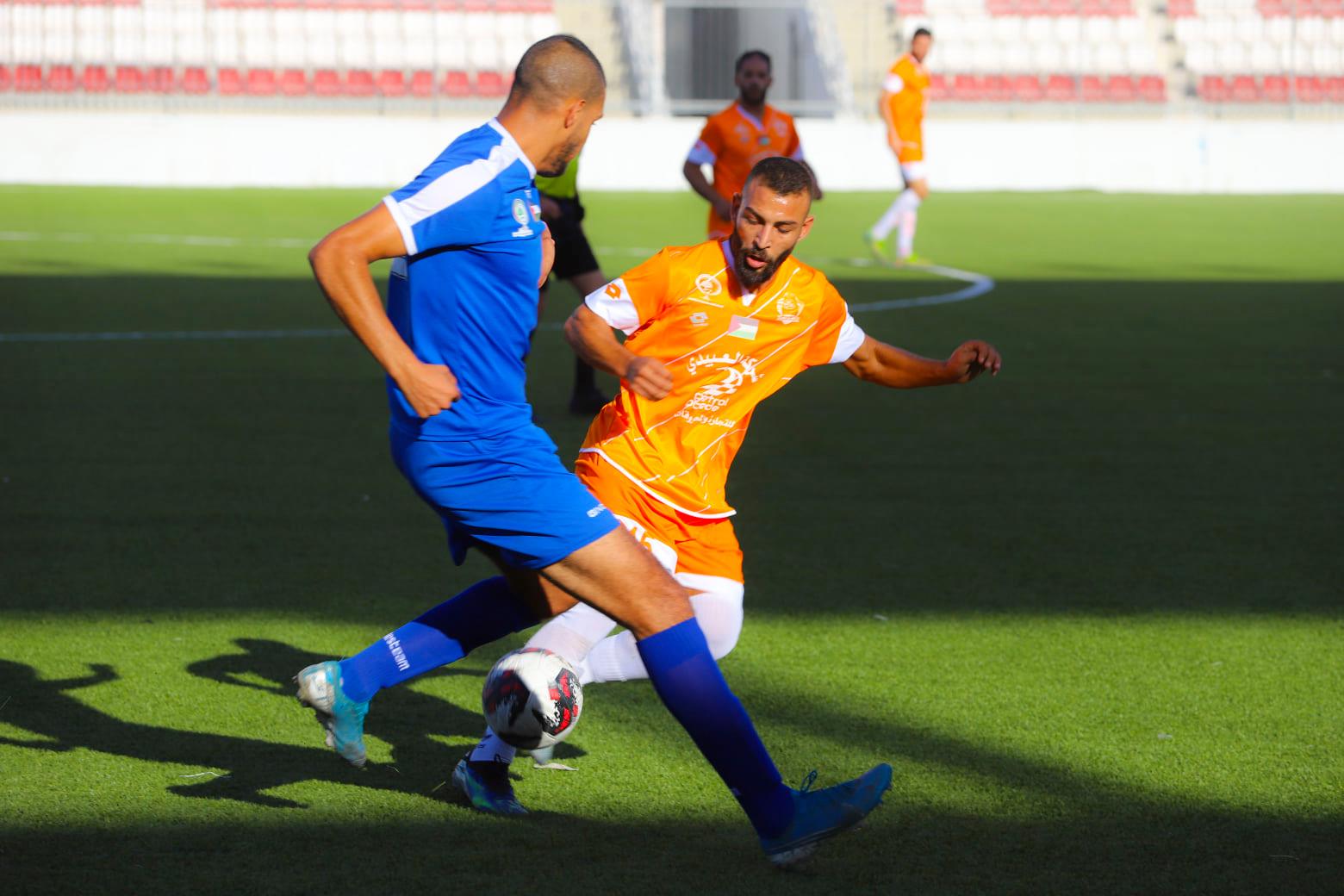 جانب من مباراة "جبل المكبر" و"هلال القدس" على استاد "فيصل  الحسيني" في بلدة الرام
